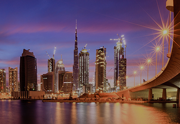 Downtown Dubai skyline at dusk.